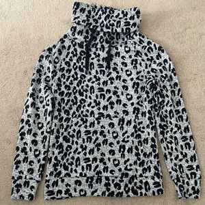 cheetah print turtle neck sweater with pockets